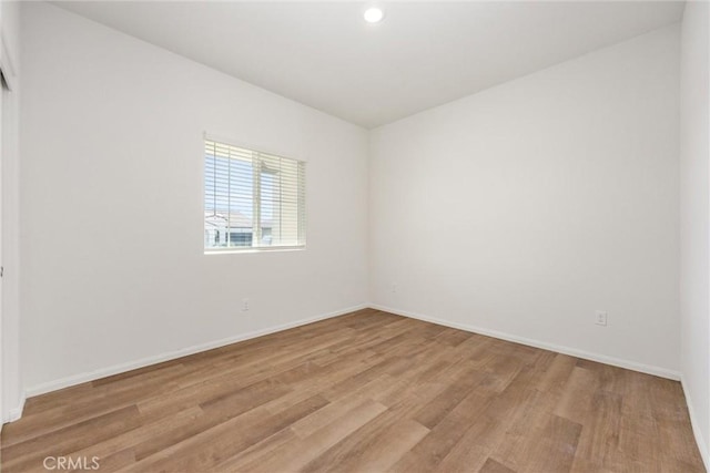 7305 Scrivia Ct, Bakersfield, CA 93311 - unfurnished room featuring light wood-style floors and recessed lighting