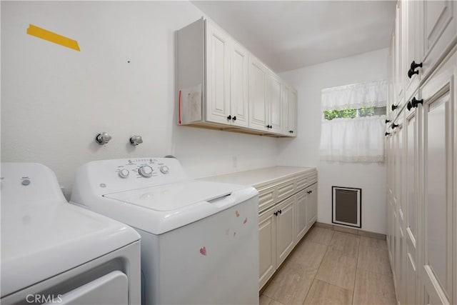 28656 Bradley Rd, Menifee, CA 92586 - washroom with washer and dryer and cabinet space