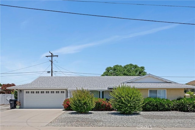 28656 Bradley Rd, Menifee, CA 92586 - ranch-style home with an attached garage, driveway, and stucco siding