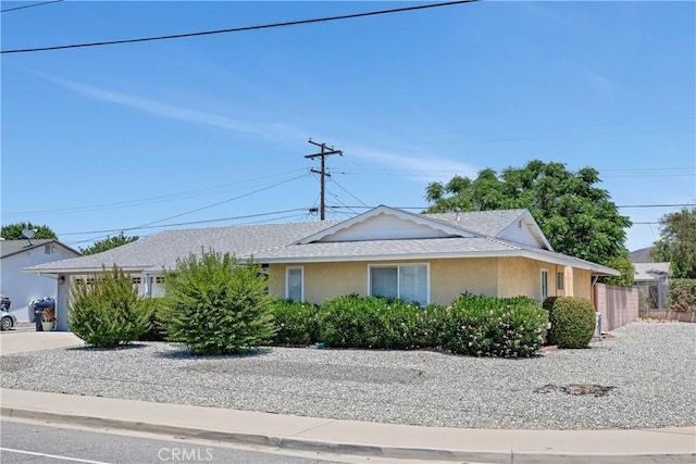 28656 Bradley Rd, Menifee, CA 92586 - view of front of home with stucco siding and roof with shingles