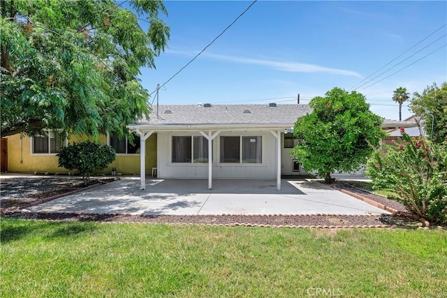 28656 Bradley Rd, Menifee, CA 92586 - back of house featuring a yard and a patio