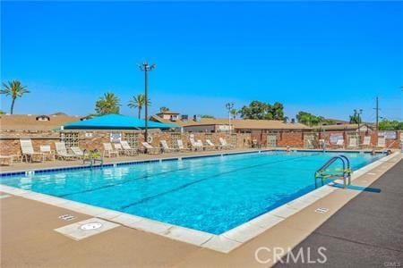 28656 Bradley Rd, Menifee, CA 92586 - community pool featuring a patio