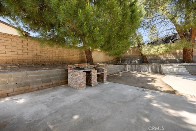 30314 Honeysuckle Hill Dr, Canyon Country, CA 91387 - fenced backyard with a patio