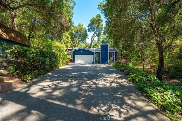 5375 Rosario Ave, Atascadero, CA 93422 - view of front of house featuring asphalt driveway and a garage