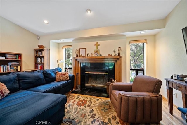5375 Rosario Ave, Atascadero, CA 93422 - living room featuring a tiled fireplace, recessed lighting, and wood finished floors