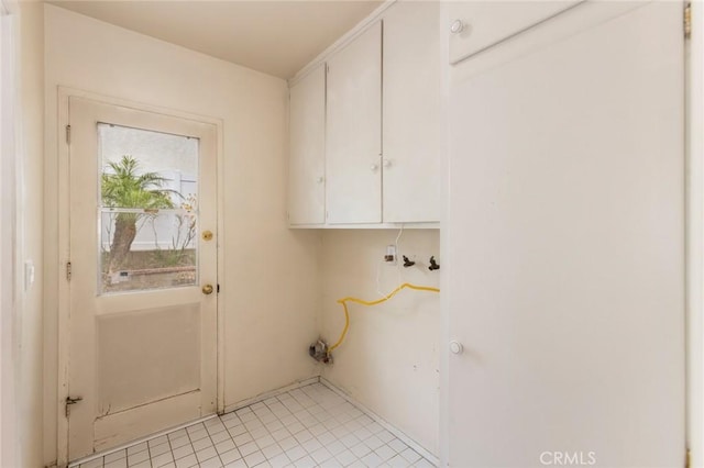 1716 Elm Ave, Manhattan Beach, CA 90266 - washroom with cabinet space and light tile patterned floors