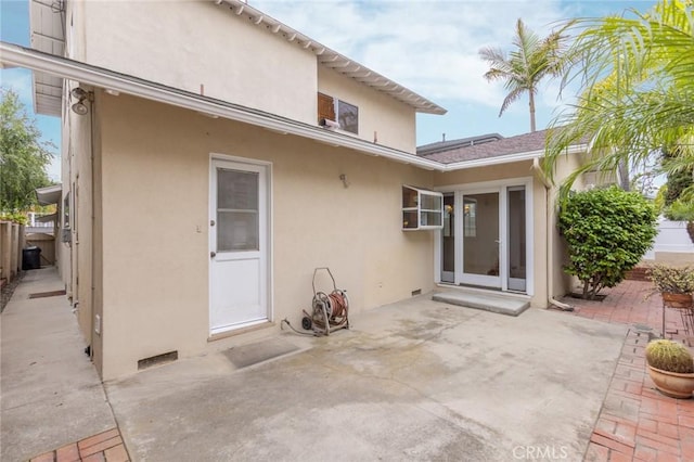 1716 Elm Ave, Manhattan Beach, CA 90266 - back of property with a patio and stucco siding