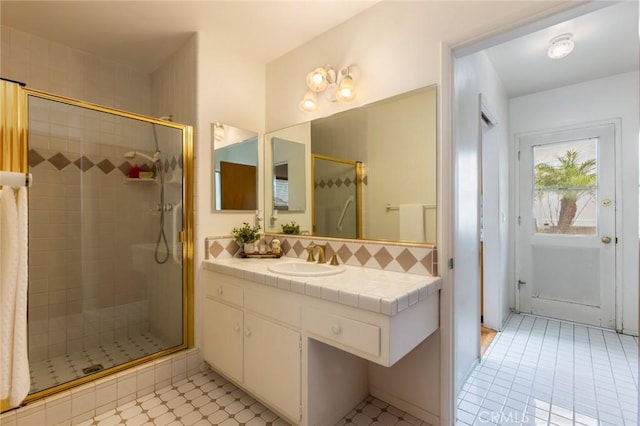 1716 Elm Ave, Manhattan Beach, CA 90266 - full bathroom with a shower stall, vanity, and backsplash