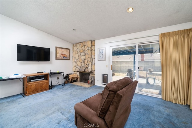 1722 Tiffany Ct, Ontario, CA 91762 - carpeted living area with vaulted ceiling, a textured ceiling, and a fireplace