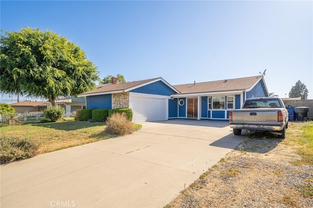 1722 Tiffany Ct, Ontario, CA 91762 - ranch-style house featuring an attached garage, concrete driveway, a chimney, and stone siding