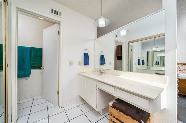 1722 Tiffany Ct, Ontario, CA 91762 - full bath with vanity, tile patterned floors, and a textured ceiling