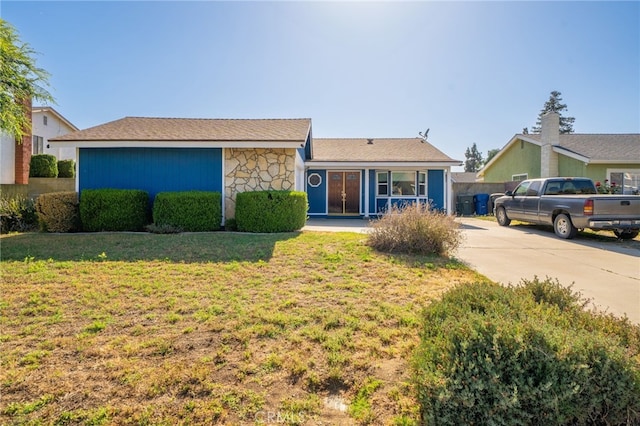 1722 Tiffany Ct, Ontario, CA 91762 - ranch-style house featuring a front lawn, stone siding, and concrete driveway