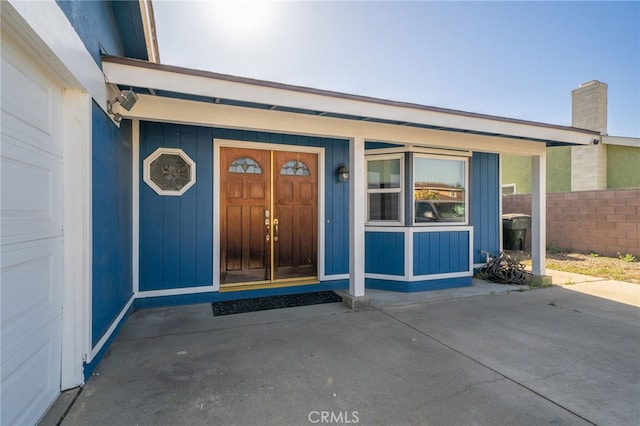 1722 Tiffany Ct, Ontario, CA 91762 - entrance to property featuring board and batten siding