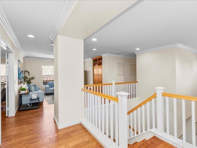 2381 Avenida Helecho, Carlsbad, CA 92009 - corridor featuring an upstairs landing, crown molding, recessed lighting, and wood finished floors