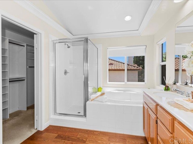 2381 Avenida Helecho, Carlsbad, CA 92009 - full bathroom with a stall shower, a bath, vanity, wood finished floors, and ornamental molding