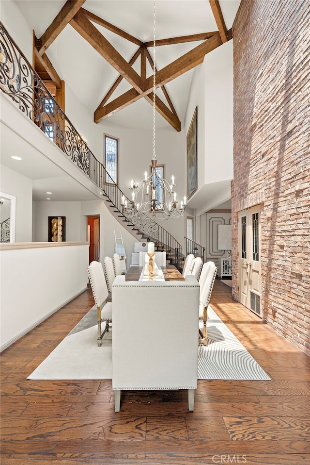 648 Harbor Island Dr, Newport Beach, CA 92660 - dining area with a high ceiling, a chandelier, stairs, beam ceiling, and wood-type flooring