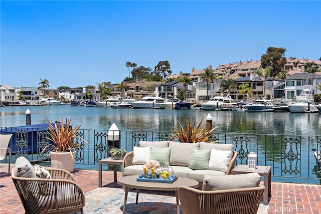 648 Harbor Island Dr, Newport Beach, CA 92660 - view of patio with an outdoor hangout area, a residential view, and a water view