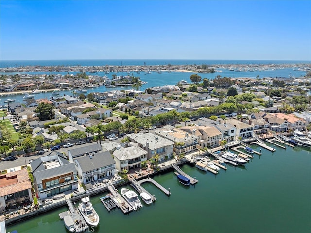 648 Harbor Island Dr, Newport Beach, CA 92660 - aerial perspective of suburban area with numerous boat docks and a nearby body of water