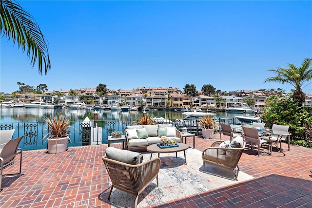 648 Harbor Island Dr, Newport Beach, CA 92660 - view of patio featuring a water view, an outdoor living space, and a residential view