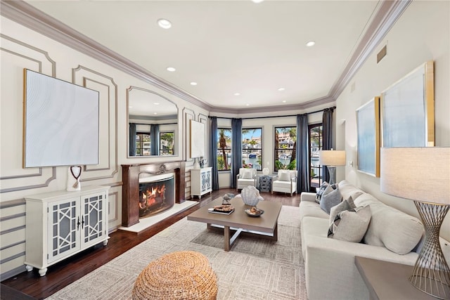 648 Harbor Island Dr, Newport Beach, CA 92660 - living room featuring crown molding, dark wood finished floors, a lit fireplace, and recessed lighting