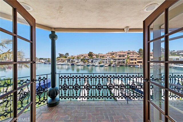 648 Harbor Island Dr, Newport Beach, CA 92660 - balcony featuring a water view