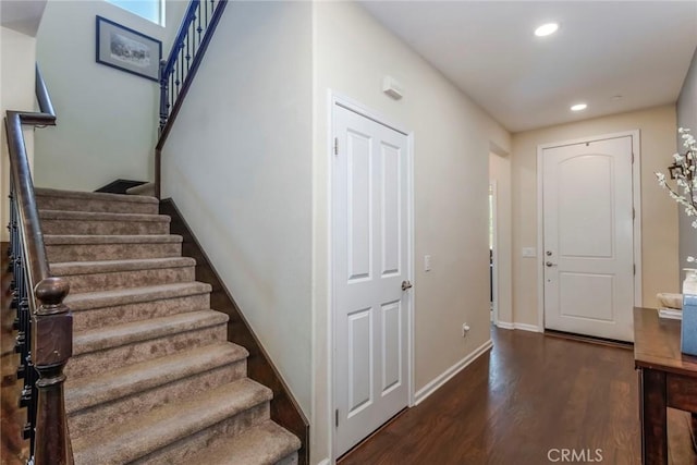 17138 Hickory Ridge Ct, Canyon Country, CA 91387 - entryway with dark wood-style floors, recessed lighting, and stairs