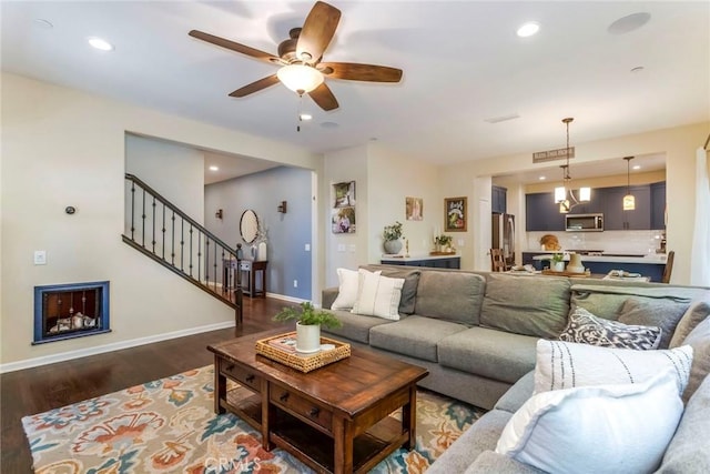 17138 Hickory Ridge Ct, Canyon Country, CA 91387 - living area featuring ceiling fan, dark wood-style flooring, stairs, and recessed lighting