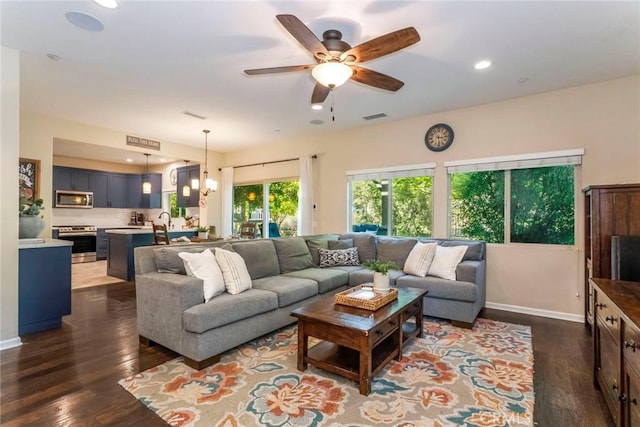 17138 Hickory Ridge Ct, Canyon Country, CA 91387 - living area with dark wood finished floors, ceiling fan, and recessed lighting