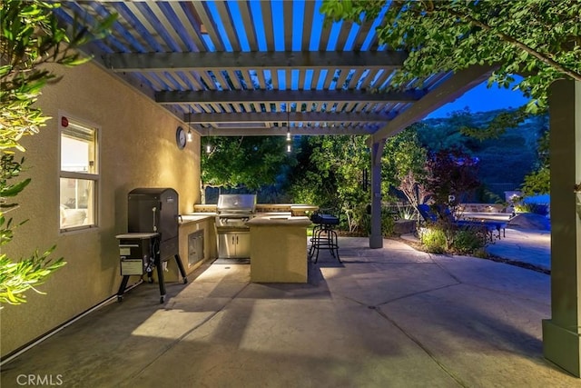 17138 Hickory Ridge Ct, Canyon Country, CA 91387 - view of patio featuring an outdoor kitchen and a pergola
