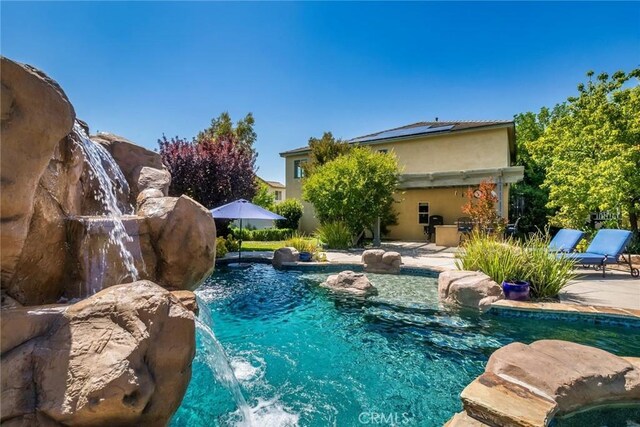 17138 Hickory Ridge Ct, Canyon Country, CA 91387 - outdoor pool with a patio area