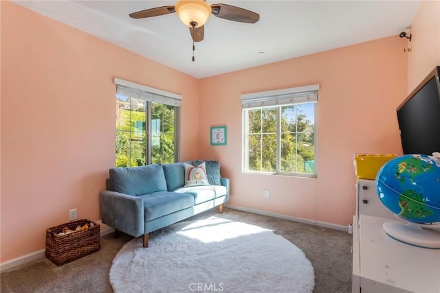 17138 Hickory Ridge Ct, Canyon Country, CA 91387 - carpeted living area with a ceiling fan and baseboards