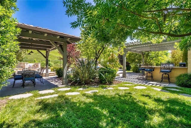 17138 Hickory Ridge Ct, Canyon Country, CA 91387 - view of grassy yard featuring a pergola and a patio area