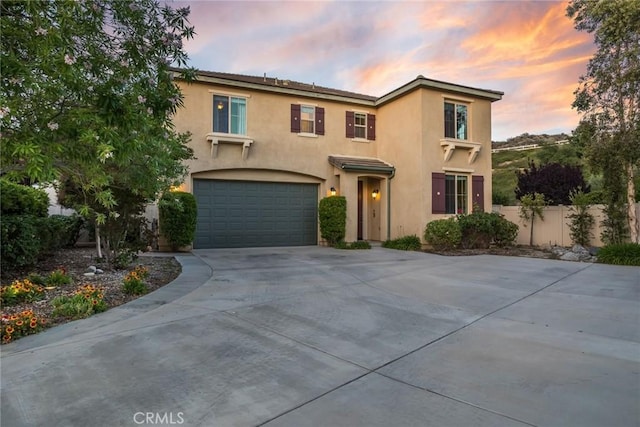 17138 Hickory Ridge Ct, Canyon Country, CA 91387 - traditional home featuring a garage, concrete driveway, and stucco siding