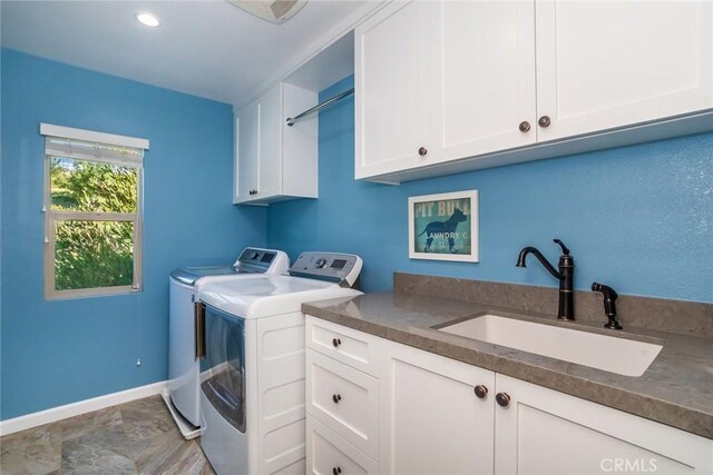 17138 Hickory Ridge Ct, Canyon Country, CA 91387 - washroom with cabinet space and washer and clothes dryer