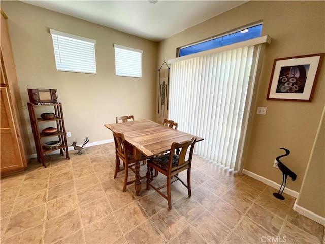 3803 Colma Ct, Merced, CA 95348 - dining space featuring baseboards