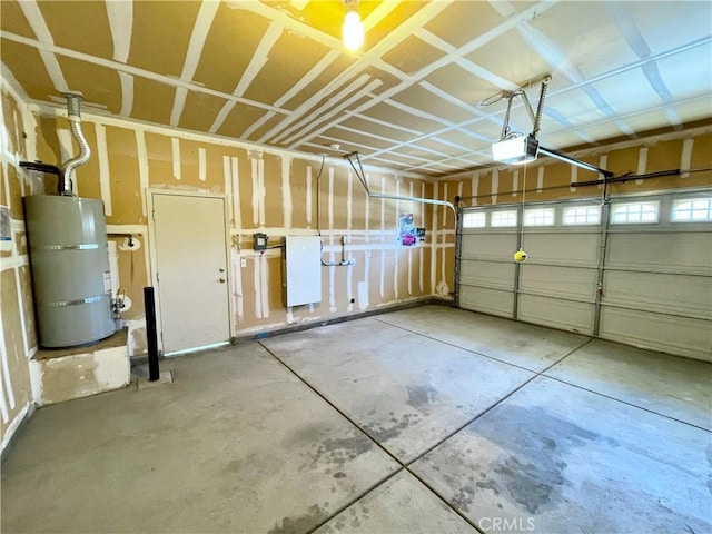 3803 Colma Ct, Merced, CA 95348 - garage with water heater and a garage door opener