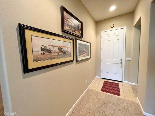 3803 Colma Ct, Merced, CA 95348 - doorway with light tile patterned floors and light colored carpet