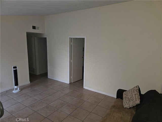 3608 Wagoner Ln, Corona, CA 92879 - spare room featuring lofted ceiling and light tile patterned floors