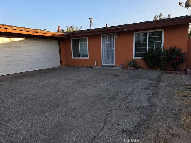 3608 Wagoner Ln, Corona, CA 92879 - ranch-style home featuring driveway, stucco siding, and a garage