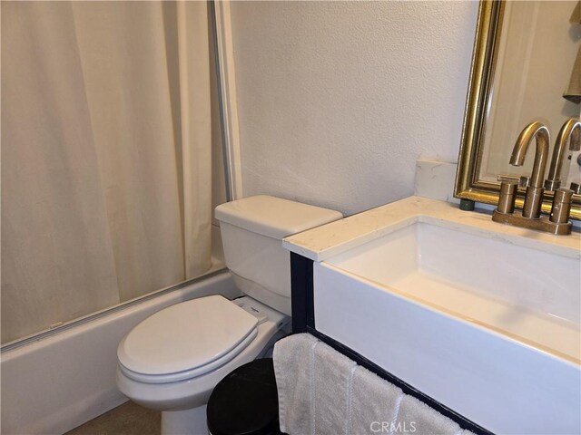 3608 Wagoner Ln, Corona, CA 92879 - full bath featuring shower / bath combo with shower curtain, vanity, and a textured wall