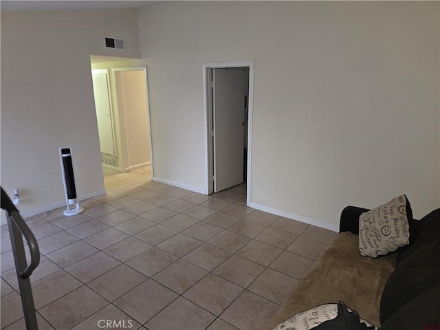 3608 Wagoner Ln, Corona, CA 92879 - spare room featuring lofted ceiling and light tile patterned floors