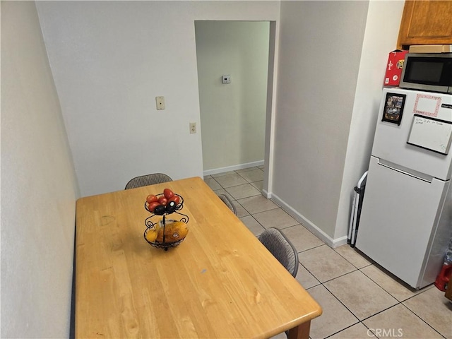 3608 Wagoner Ln, Corona, CA 92879 - dining room with light tile patterned flooring and baseboards
