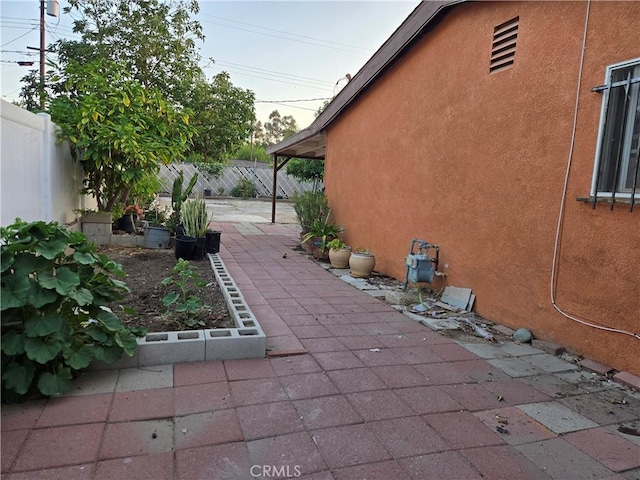 3608 Wagoner Ln, Corona, CA 92879 - fenced backyard featuring a patio