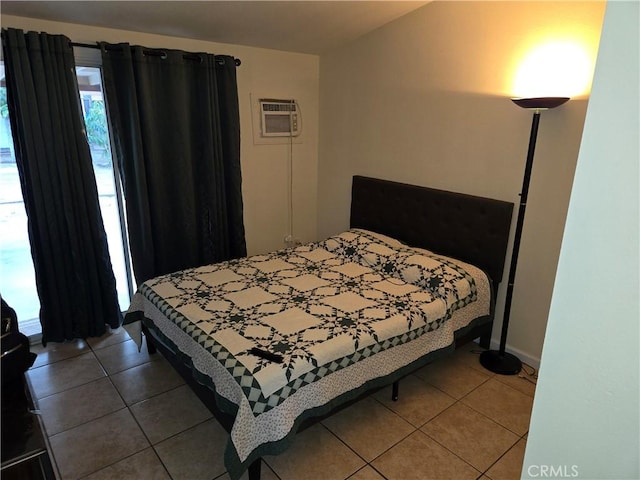 3608 Wagoner Ln, Corona, CA 92879 - tiled bedroom featuring an AC wall unit and baseboards
