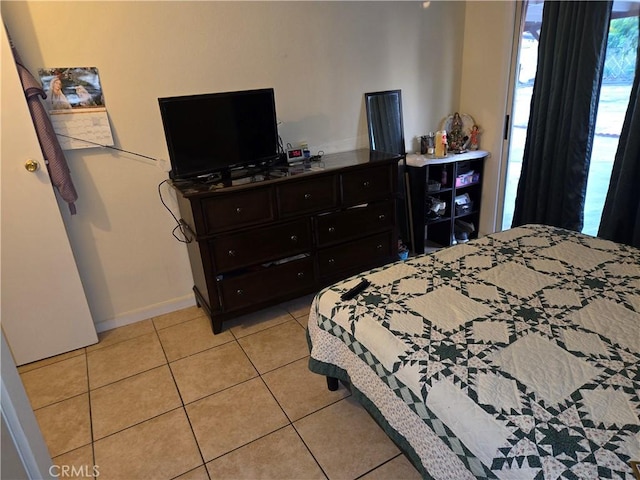 3608 Wagoner Ln, Corona, CA 92879 - bedroom with light tile patterned floors and baseboards