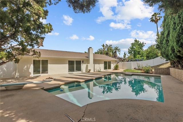 12847 Winthrop Ave, Granada Hills, CA 91344 - view of pool with a patio area and a fenced backyard