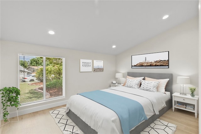 12847 Winthrop Ave, Granada Hills, CA 91344 - bedroom with light wood finished floors, recessed lighting, and vaulted ceiling