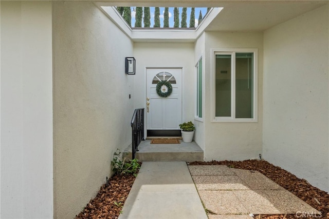 12847 Winthrop Ave, Granada Hills, CA 91344 - view of exterior entry featuring stucco siding