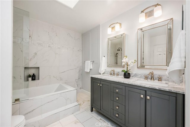 503 Morning Canyon Rd Unit 9, Corona Del Mar, CA 92625 - full bathroom featuring marble look tile flooring, double vanity, and a tub with marble appearance