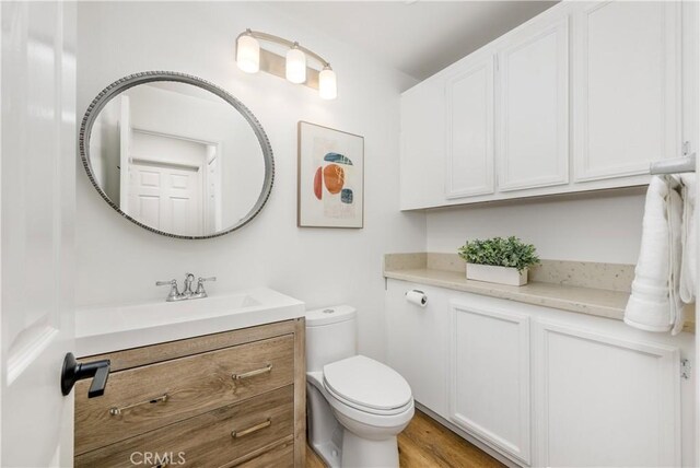 503 Morning Canyon Rd Unit 9, Corona Del Mar, CA 92625 - bathroom with vanity and wood finished floors